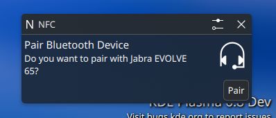 Notification after scanning a Bluetooth headset with built-in NFC pairing information.
